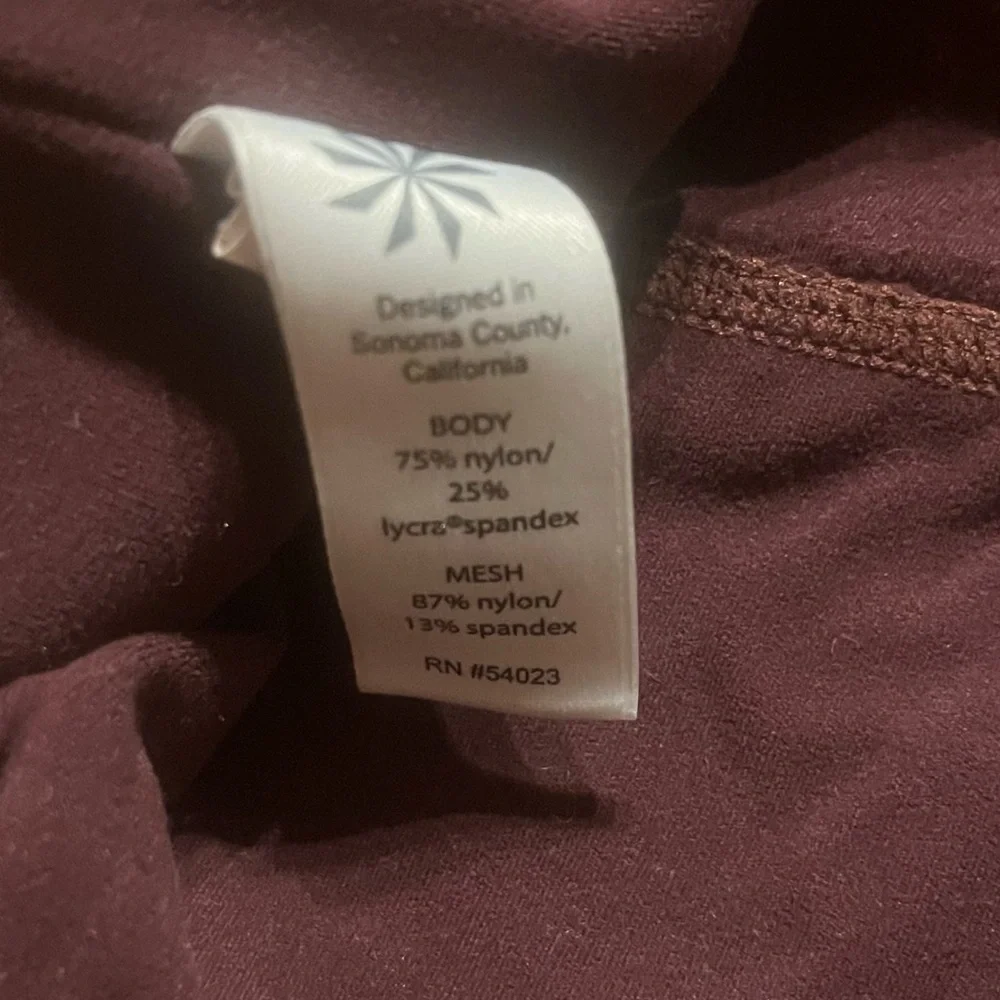 Athleta High-Rise Powervita Peekaboo 7/8 Tight in Maroon - Picture 13 of 14